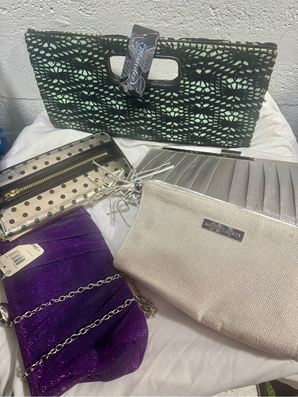 6 pieces of clutches tag and without tag